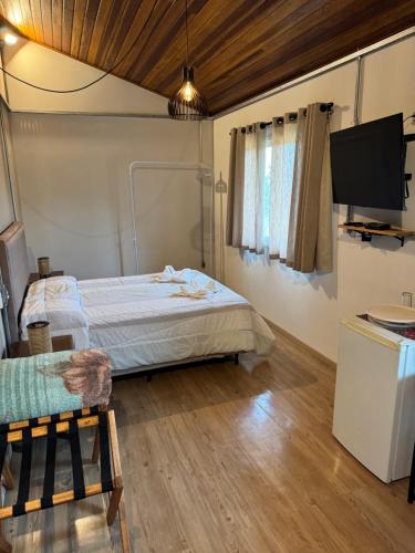 Μια τηλεόραση ή/και κέντρο ψυχαγωγίας στο Hospedaria dos Alpes