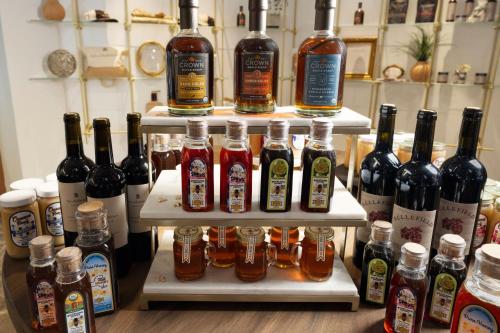 a display of different types of bottles of alcohol at Inn at Bellefield Residence Inn by Marriott in Hyde Park