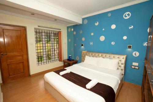 Ένα ή περισσότερα κρεβάτια σε δωμάτιο στο Lazo Silver Lake , Ooty