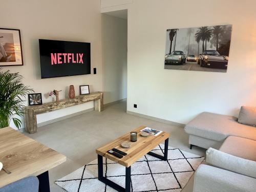 Le Polygone Gîte Arrasにあるテレビまたはエンターテインメントセンター