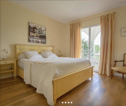 Postel nebo postele na pokoji v ubytování LE CLOS D'IGNAC