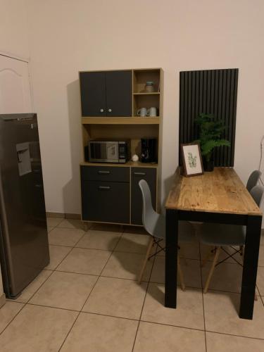 Una cocina o cocineta en Apartamento Ejecutivo