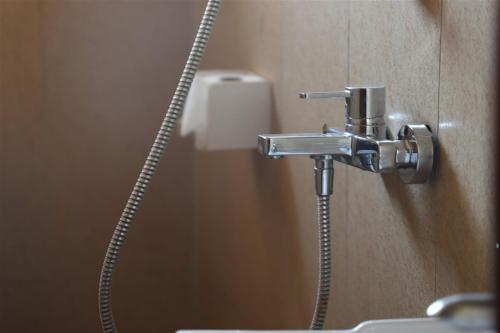 Koupelna v ubytování Hotel Intertropics