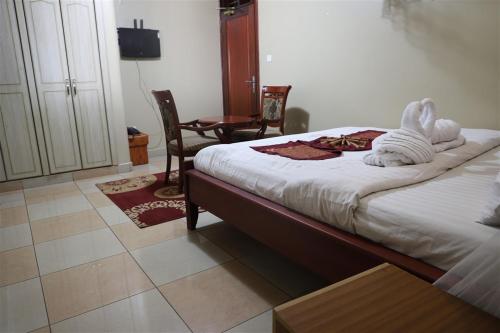 Postel nebo postele na pokoji v ubytování Hotel Intertropics