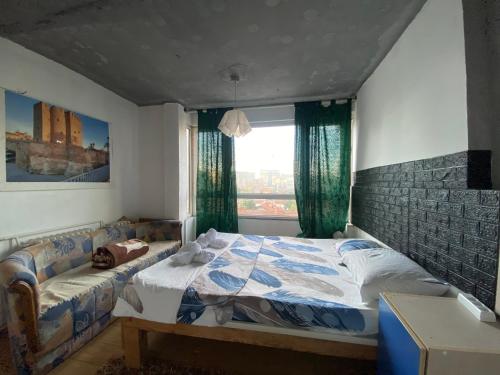 Llit o llits en una habitació de Agimina