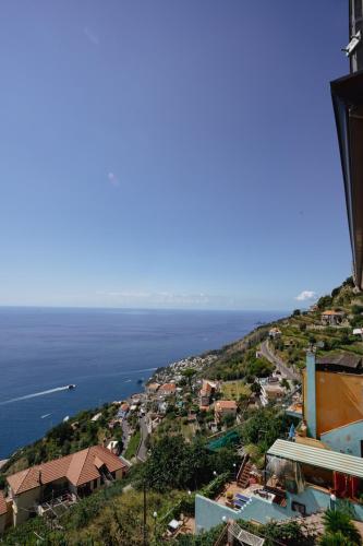 a view of a town and the ocean at Furore house of Benedetta in Furore