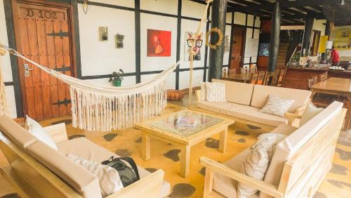 Un lugar para sentarse en Coffee Tree Boutique Hostel