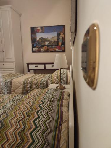 Ένα ή περισσότερα κρεβάτια σε δωμάτιο στο Solimena House