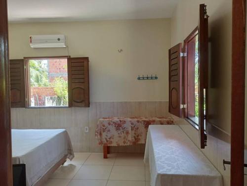 En eller flere senge i et værelse på Casa Biana