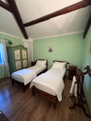 Postel nebo postele na pokoji v ubytování Hacienda De Leon
