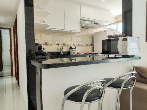 Dapur atau dapur kecil di Incrível Apto 2 quartos no centro