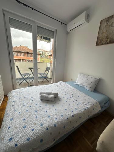 Llit o llits en una habitació de Apartment Guri