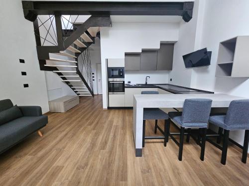Η κουζίνα ή μικρή κουζίνα στο Mezzago Royal Suites