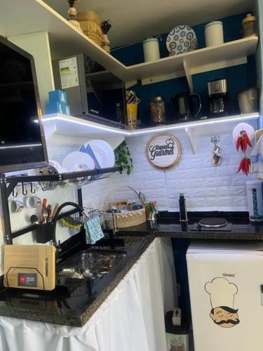 Dapur atau dapur kecil di Pé na Areia - Itaúna Saquarema Loft Mimo AconXego