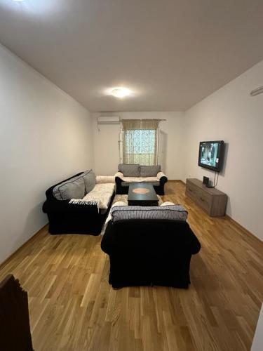 Tempat tidur dalam kamar di Viktor Apartman