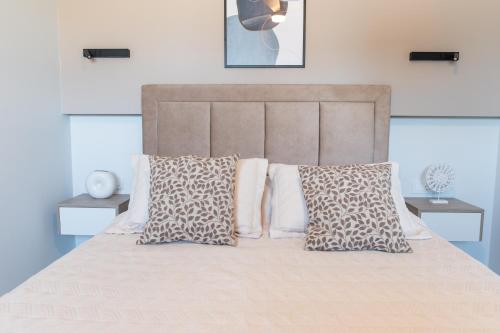 Katil atau katil-katil dalam bilik di Nalu Luxury Suites Adults Only