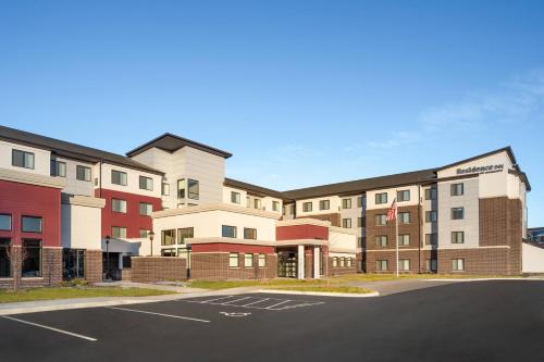a rendering of a hotel with a parking lot at Residence Inn by Marriott Minneapolis St. Paul/Eagan in Eagan
