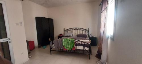 Llit o llits en una habitació de Teranga