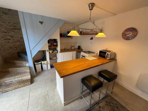 Kuchyň nebo kuchyňský kout v ubytování Courtyard cosy cottage