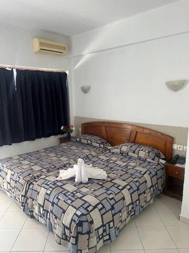 Cama o camas de una habitación en Studiotel Afoud