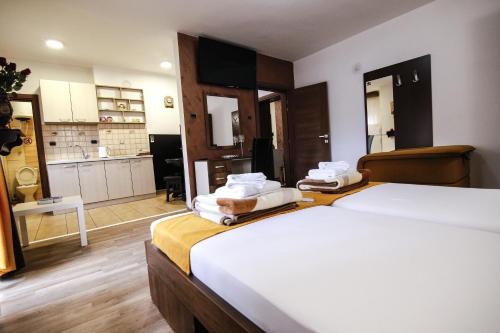 Η κουζίνα ή μικρή κουζίνα στο Apartmani Centar Kumanovo