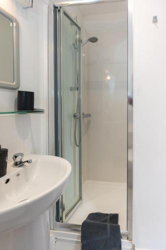 a bathroom with a sink and a shower at The Court in Bridgnorth