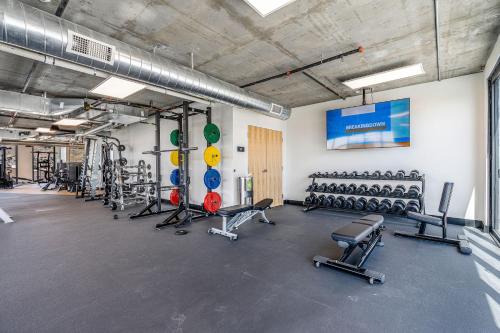 a gym with a lot of exercise equipment in it at Best views! Lux 9th fl Gym Pking Pool Htub King BD in Salt Lake City
