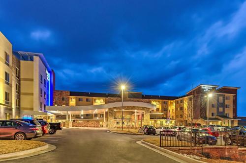 a parking lot in front of a hospital at Residence Inn by Marriott St. Louis Westport in Maryland Heights