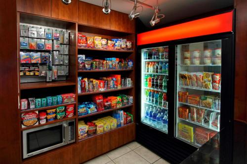 a grocery store with a refrigerator and a microwave at Courtyard by Marriott St. George in St. George