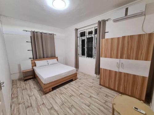 Postel nebo postele na pokoji v ubytování Elysiane