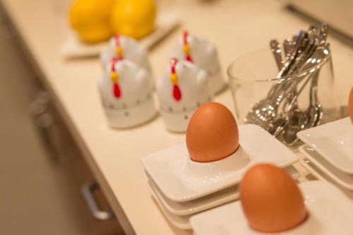 a counter with two eggs on a white plate at Hotel Glasererhaus in Zell am See