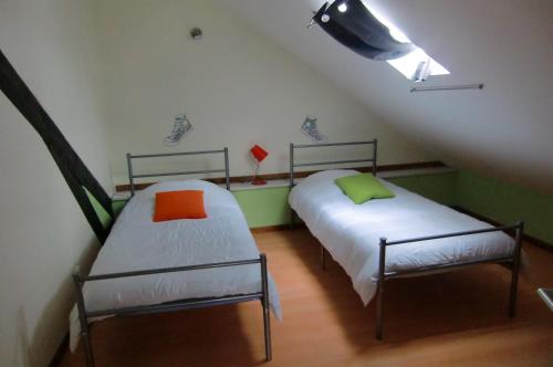 Postel nebo postele na pokoji v ubytování Gite Des Noisetiers