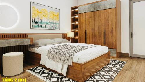 a bedroom with a large bed with a wooden headboard at An HOSTEL in Ninh Binh
