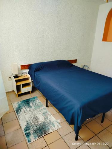 Ένα ή περισσότερα κρεβάτια σε δωμάτιο στο Casa Bravo Celaya