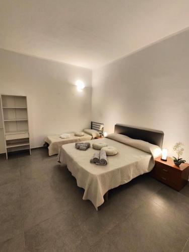 Postel nebo postele na pokoji v ubytování Sant'Antonio Flats