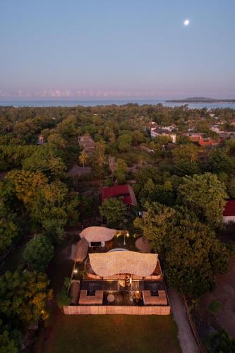 an overhead view of a building in the middle of a forest at Villa Samyama in Gili Air
