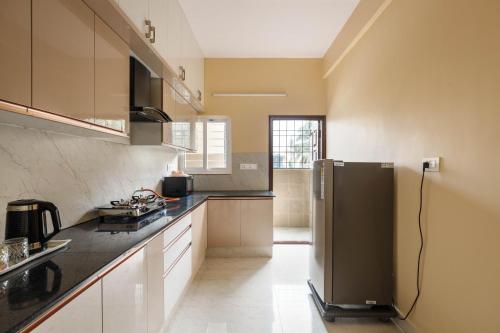 Dapur atau dapur kecil di Pinnacle Serviced Apartments