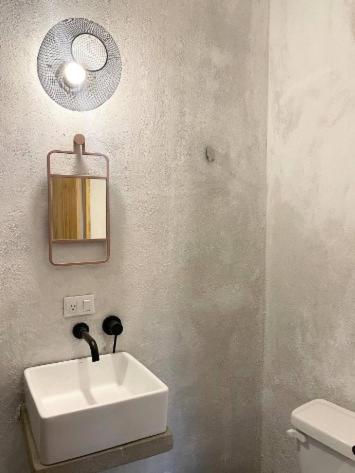 a bathroom with a sink and a toilet at EB5 Escape-Contemporary Stay, San Marcos La Laguna #8 in San Marcos La Laguna