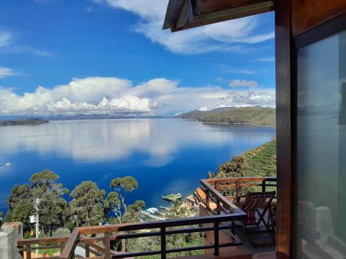 a view of a lake from a house at Casa Andina - ISLA DEL SOL in Comunidad Yumani