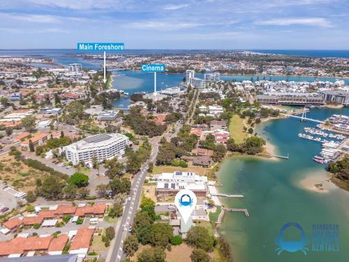 an aerial view of a city with a harbor at Mandurah Overlooking The Marina in Mandurah