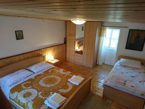 Postel nebo postele na pokoji v ubytování Holiday house with a parking space Vucevica, Zagora - 23454