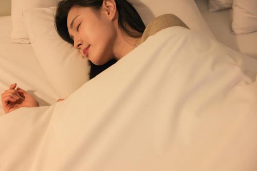 Postel nebo postele na pokoji v ubytování VIP Hotel Mokpo