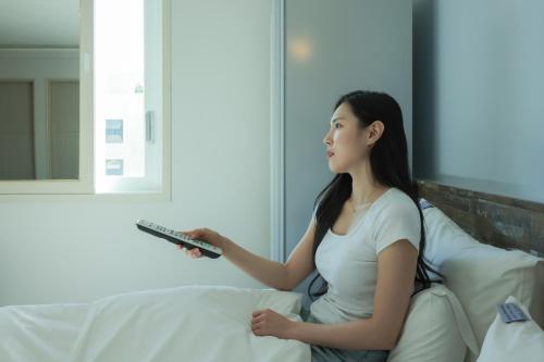 Postel nebo postele na pokoji v ubytování VIP Hotel Mokpo