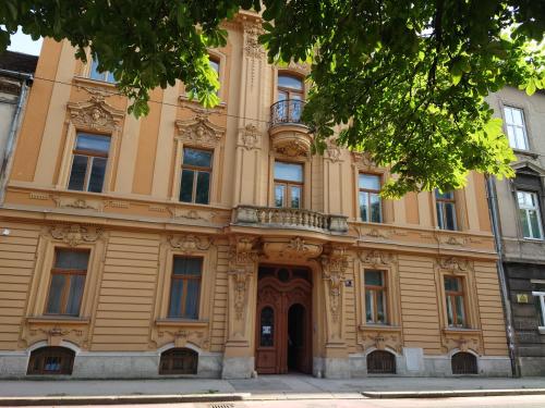 an old building in the middle of a street at CENTRAL 2 ZAGREB in Zagreb