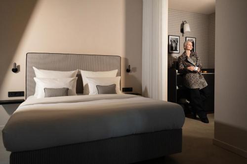 MIANO Hotel & Barにあるベッド