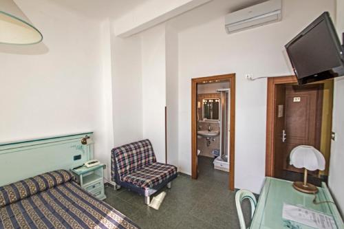TV a/nebo společenská místnost v ubytování Hotel Baia