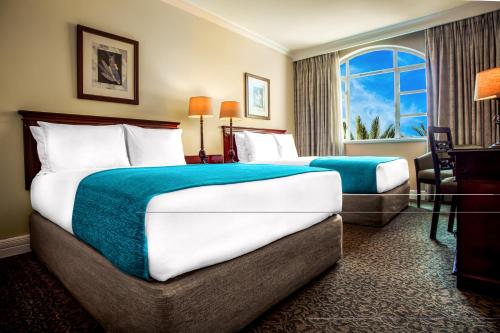 Katil atau katil-katil dalam bilik di The Ridge Hotel