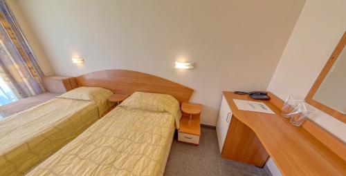 Ένα ή περισσότερα κρεβάτια σε δωμάτιο στο Hotel Pliska - All Inclusive Light