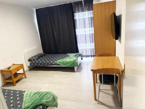 Кровать или кровати в номере Cozy Apartment in Sankt Augustin