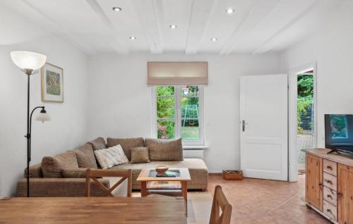 Μια τηλεόραση ή/και κέντρο ψυχαγωγίας στο Ferienhaus Nahe Der Müritz